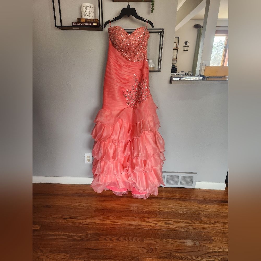 Peachy prom dress with ruffled bottom